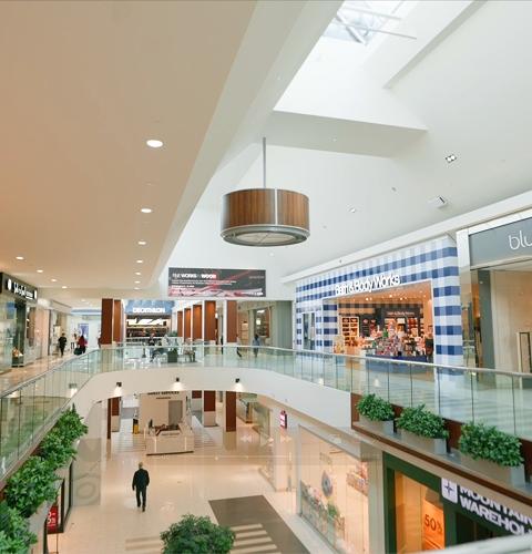 Upper-level mall walkway with Bath & Body Works, Blu's and Decathlon storefronts