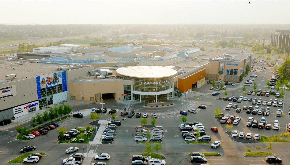 Aerial view of Southcentre mall and parking lots at dusk