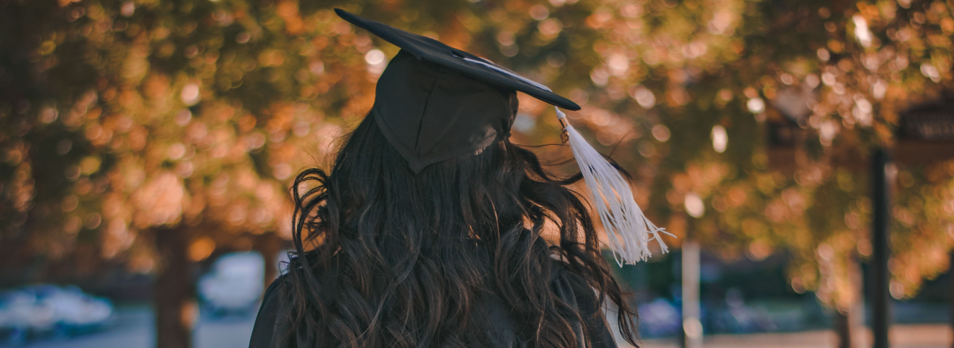 Girl with a graduation cap and gown