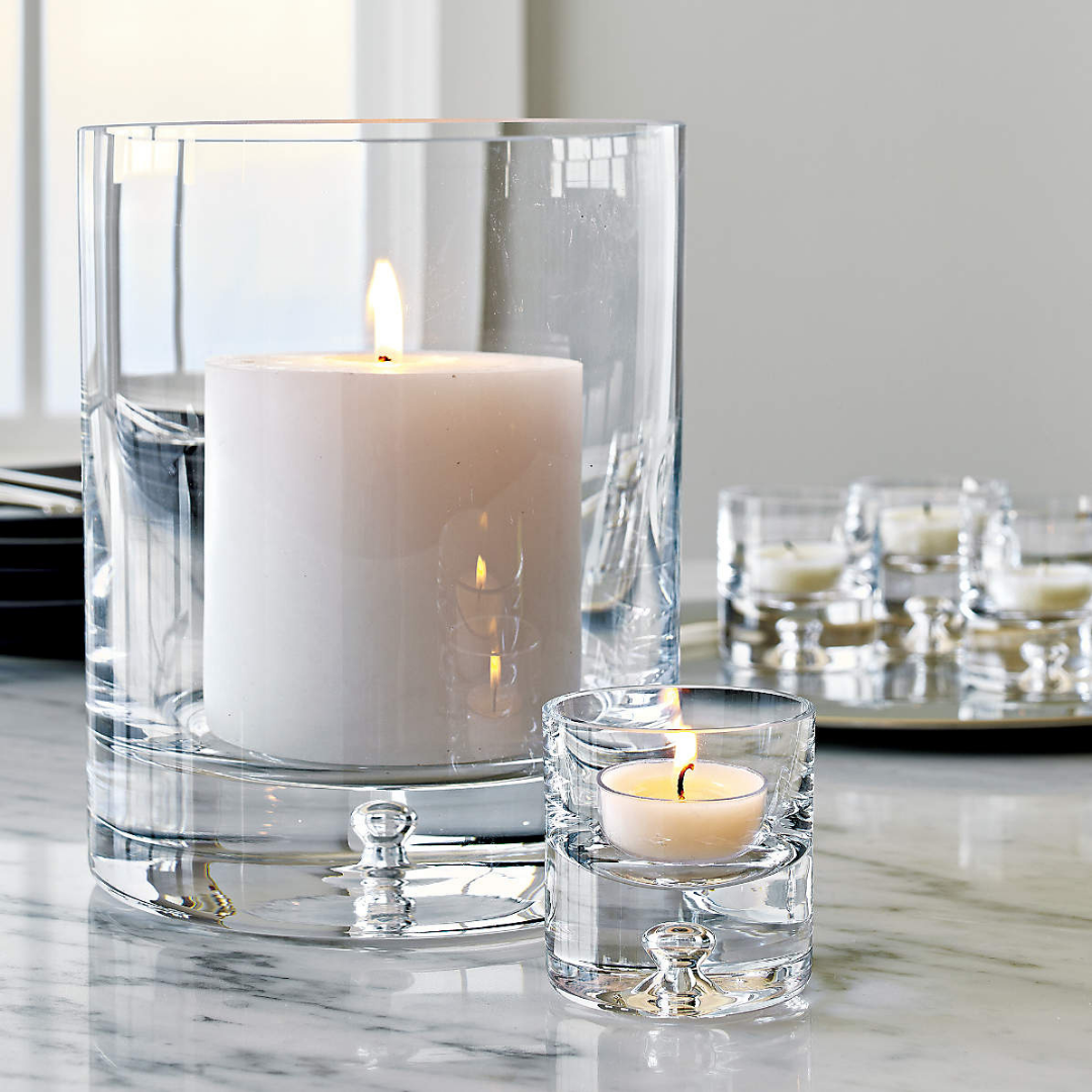 Glass candle holders with light candles