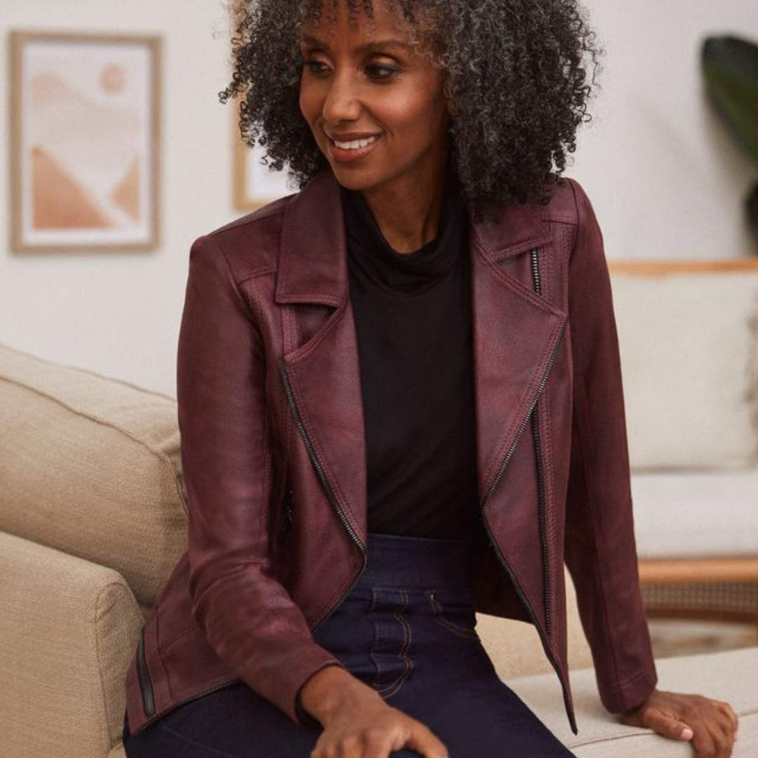 Woman wearing burgundy suede jacket