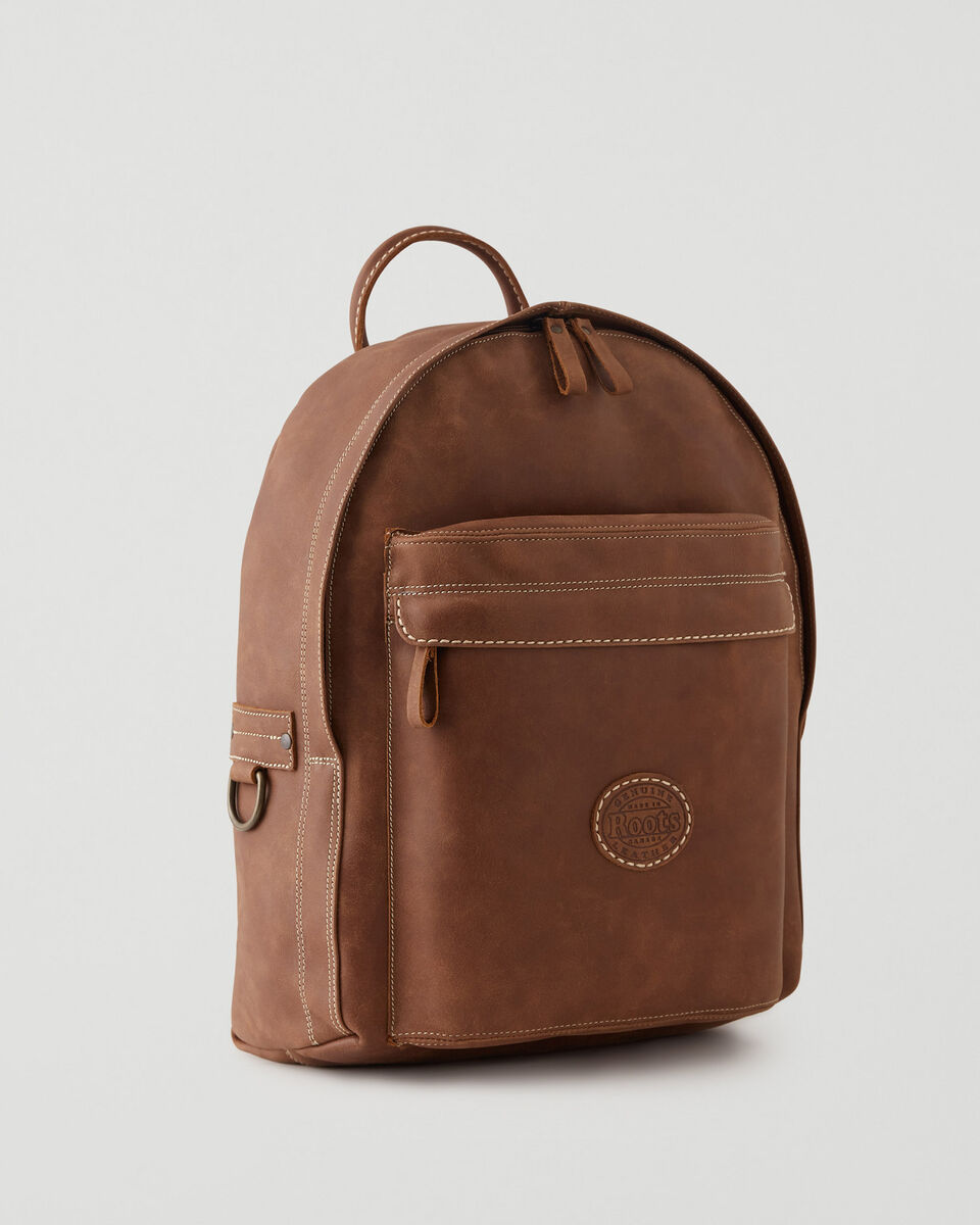 brown leather roots backpack