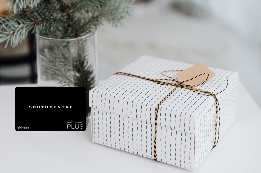 a white gift box with a Southcentre gift card beside it