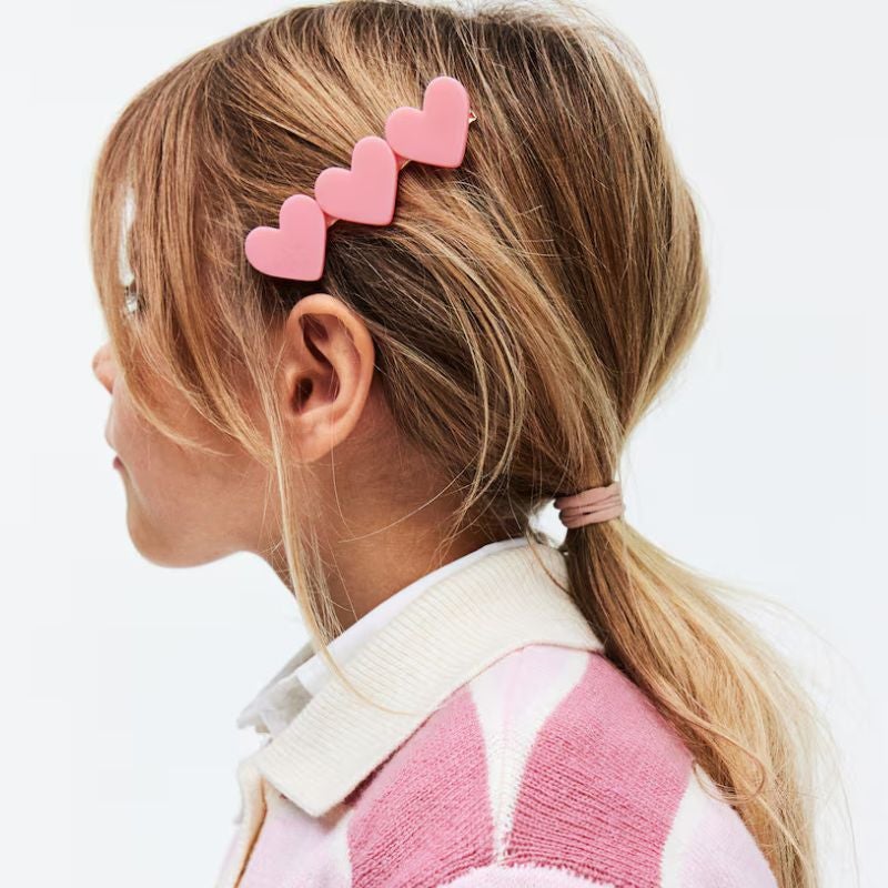 Heart hair clips in hair